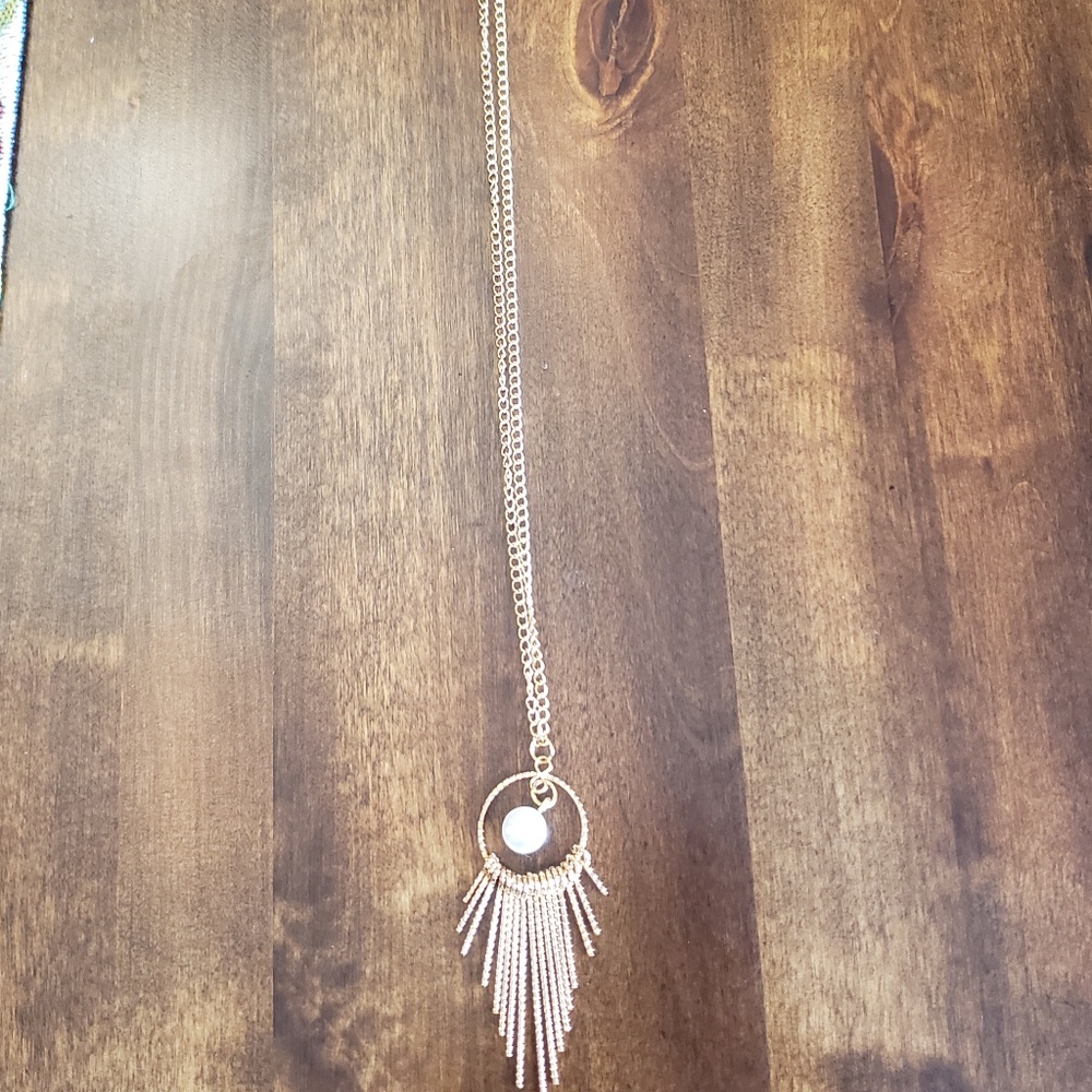 Art Deco style gold colored necklace with faux pearl